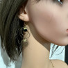 Boucles d'oreilles asymétriques